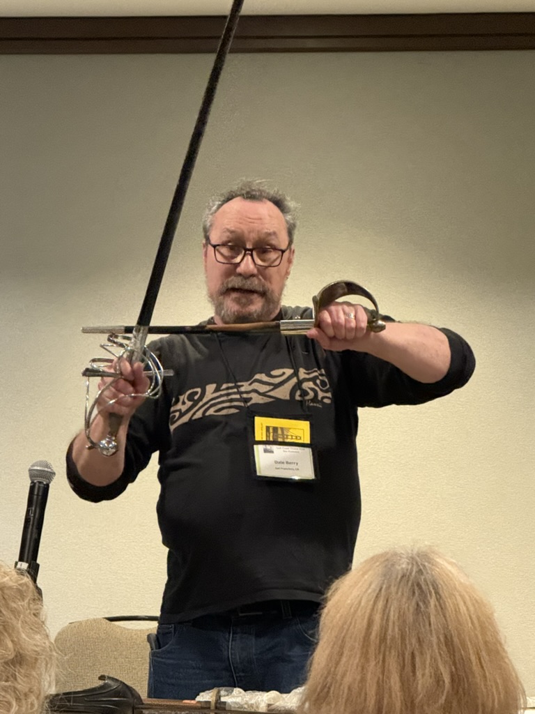 Dale blocking with a rapier and dagger